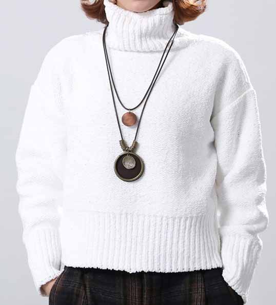 Woman-dressed-white-jumper-wears-SABO-Tree-of Life-Pendant-color-brown-Mayfairtrends