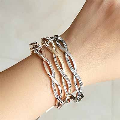 Infinity-Twinkle-Crystal-Bracelet-on-womans-wrist