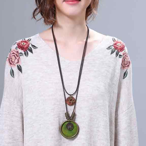 Woman-dressed-gray-jumper-wearing-SABO-Tree-of-Life-Pendant-Mayfairtrends