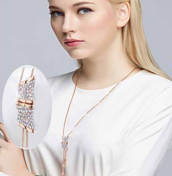 woman-wearing-Necklace-Art_Deco-Lucky-Crystal-Bamboo-Charm-colour-gold-mayfairtrends