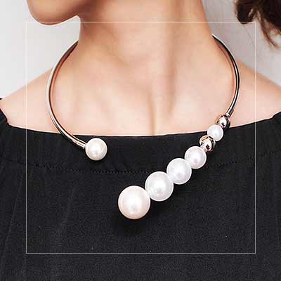 woman-wearing-Pearl-Open-Collar-Torc-Necklace-mayfairtrends