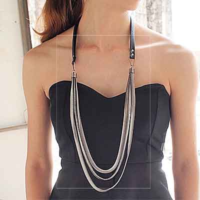 woman-wearing-silver-Art-Deco-Triple-Herringbone-Necklace-mayfairtrends