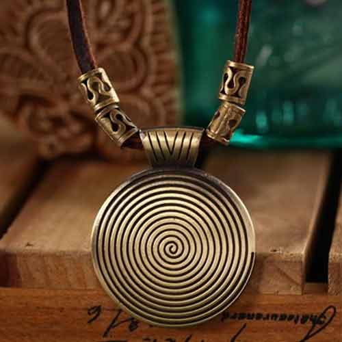 wood-background-Mayfair-Boho-Spiral-Necklace