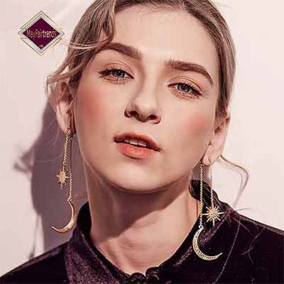young-woman-wearing-Art-Deco-Graff-Moon-Stars-Earrings-mayfairtrends